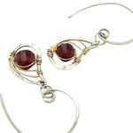 mini sterling silver hammered paisleys with garnet faceted gemstones in gold filled wire on our handmade sterling hoop hook earrings