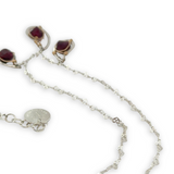 Sterling silver mini triple paisley pendant necklace with garnet faceted gemstones on a heart shaped delicate chain