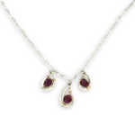 Sterling silver mini triple paisley pendant necklace with garnet faceted gemstones on a heart shaped delicate chain