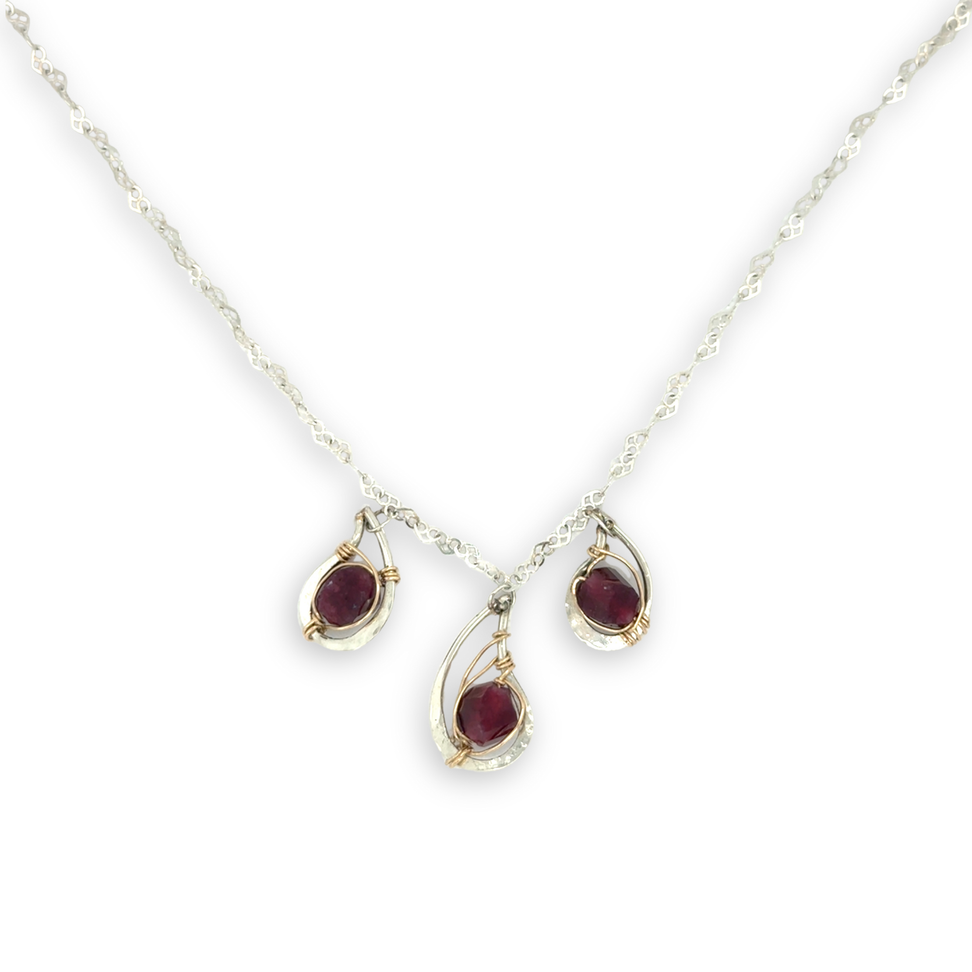 Sterling silver mini triple paisley pendant necklace with garnet faceted gemstones on a heart shaped delicate chain