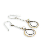 Hammered brass and oxidized sterling silver twist drop earrings on dainty chain