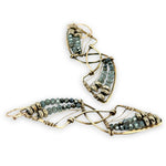 Pyrite gemstones and crystal on gold filled wire decorate brass interlocking frames to form a shooting star on gold filled earring hooks