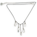 darkened sterling silver chain with five cascading, different sized hammered sterling silver teardrops necklace