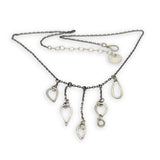 darkened sterling silver chain with five cascading, different sized hammered sterling silver teardrops necklace