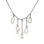 darkened sterling silver chain with five cascading, different sized hammered sterling silver teardrops necklace