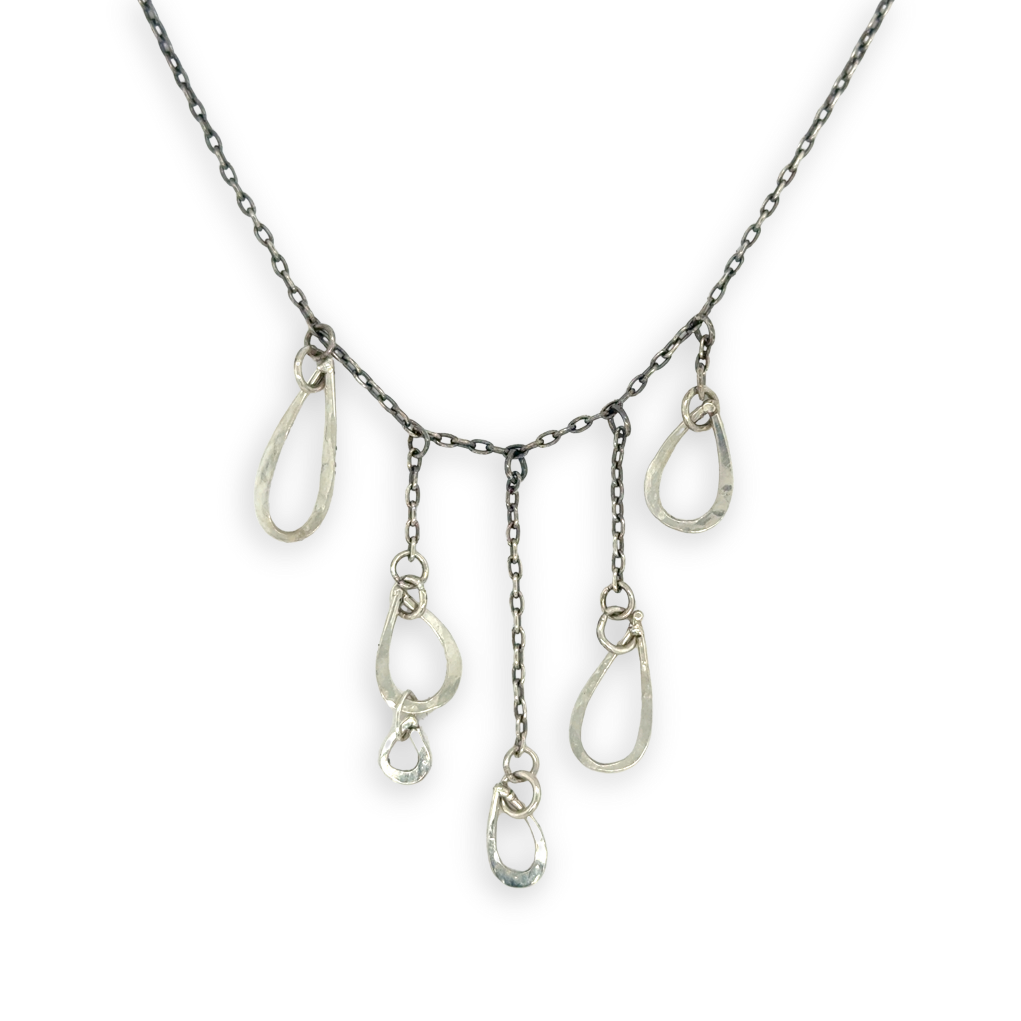 darkened sterling silver chain with five cascading, different sized hammered sterling silver teardrops necklace