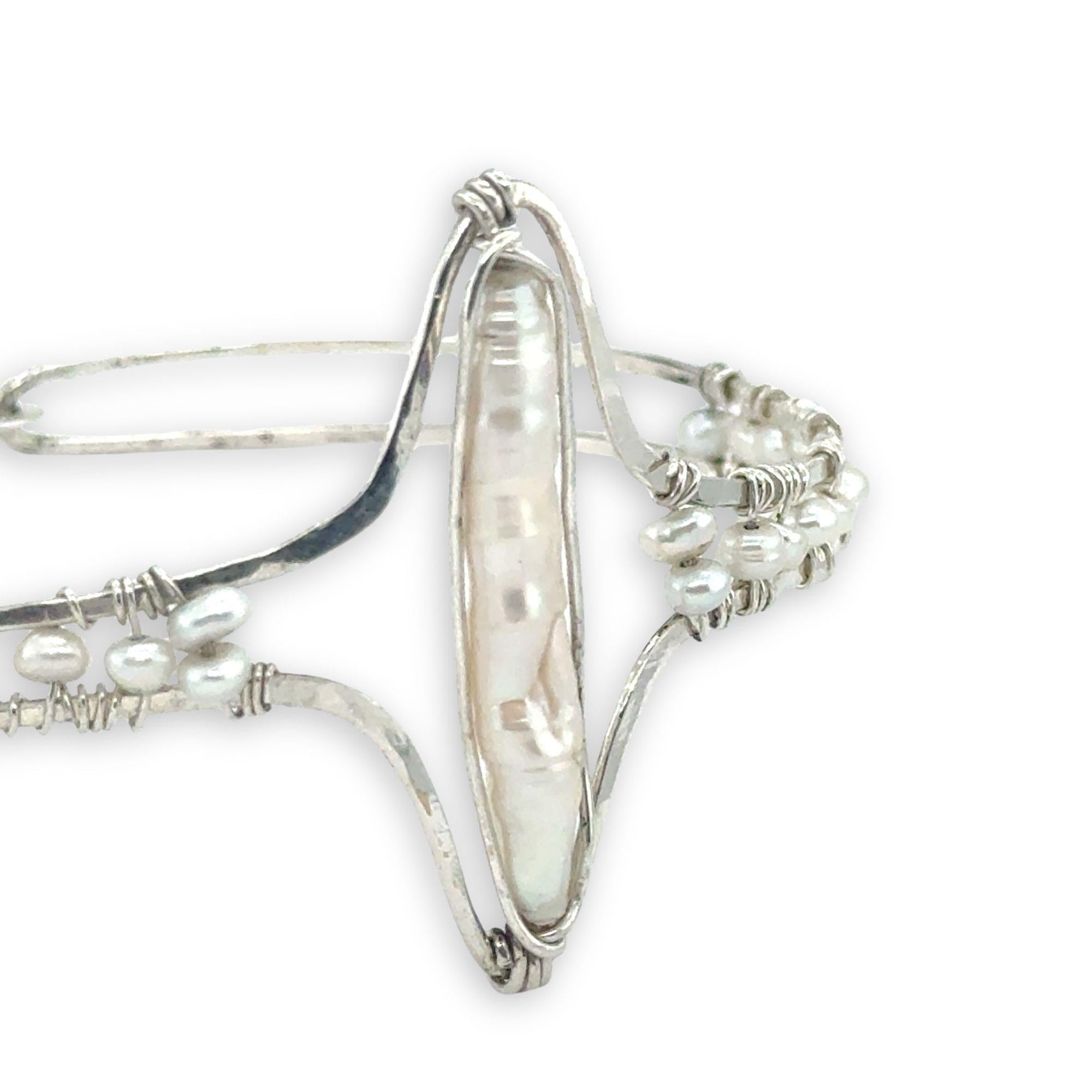 Hammered sterling silver statement cuff bracelet accented with fresh water pearl stick and seed pearls