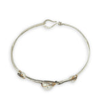 Sterling silver twisted bracelet with dark sterling twisted wire and fresh water pearls wrapped in gold fill wire