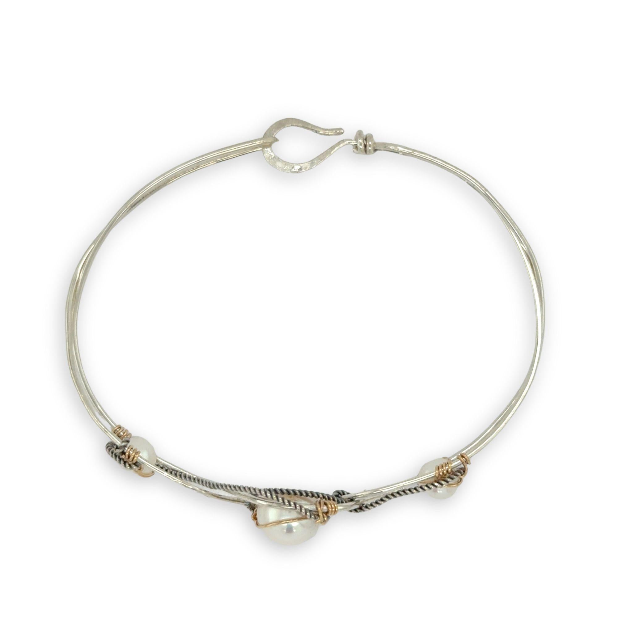 Sterling silver twisted bracelet with dark sterling twisted wire and fresh water pearls wrapped in gold fill wire