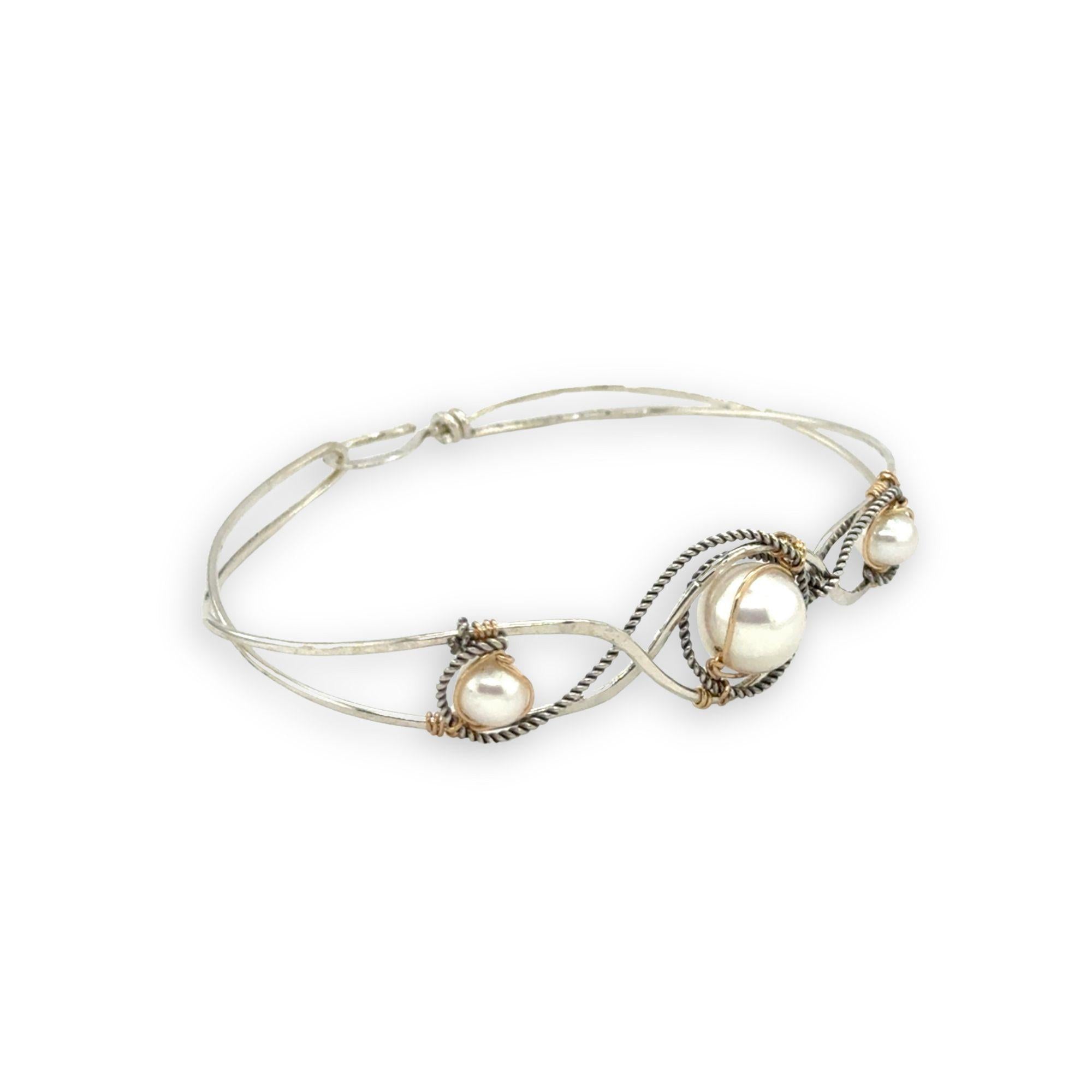 Sterling silver twisted bracelet with dark sterling twisted wire and fresh water pearls wrapped in gold fill wire