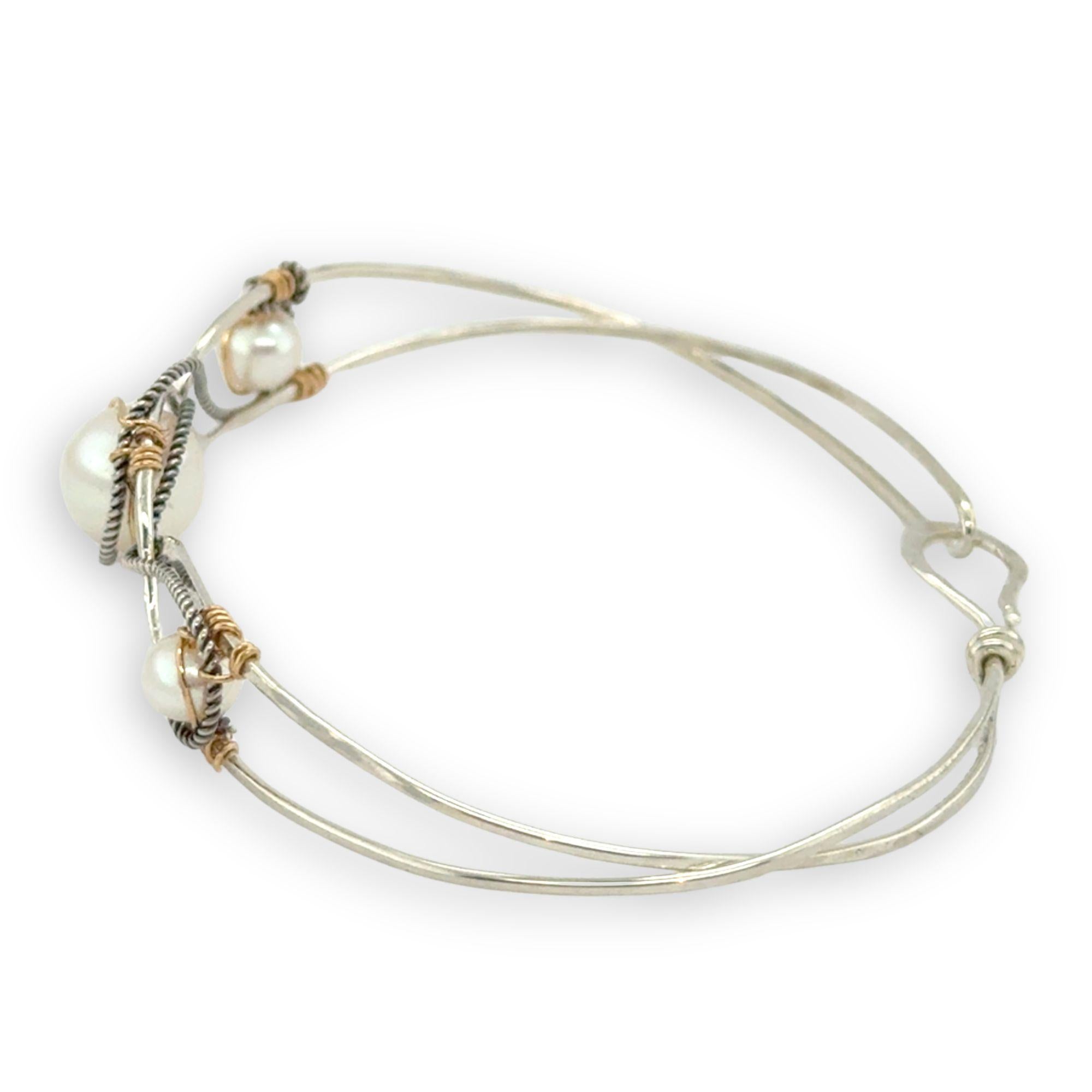 Sterling silver twisted bracelet with dark sterling twisted wire and fresh water pearls wrapped in gold fill wire