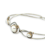 Sterling silver twisted bracelet with dark sterling twisted wire and fresh water pearls wrapped in gold fill wire