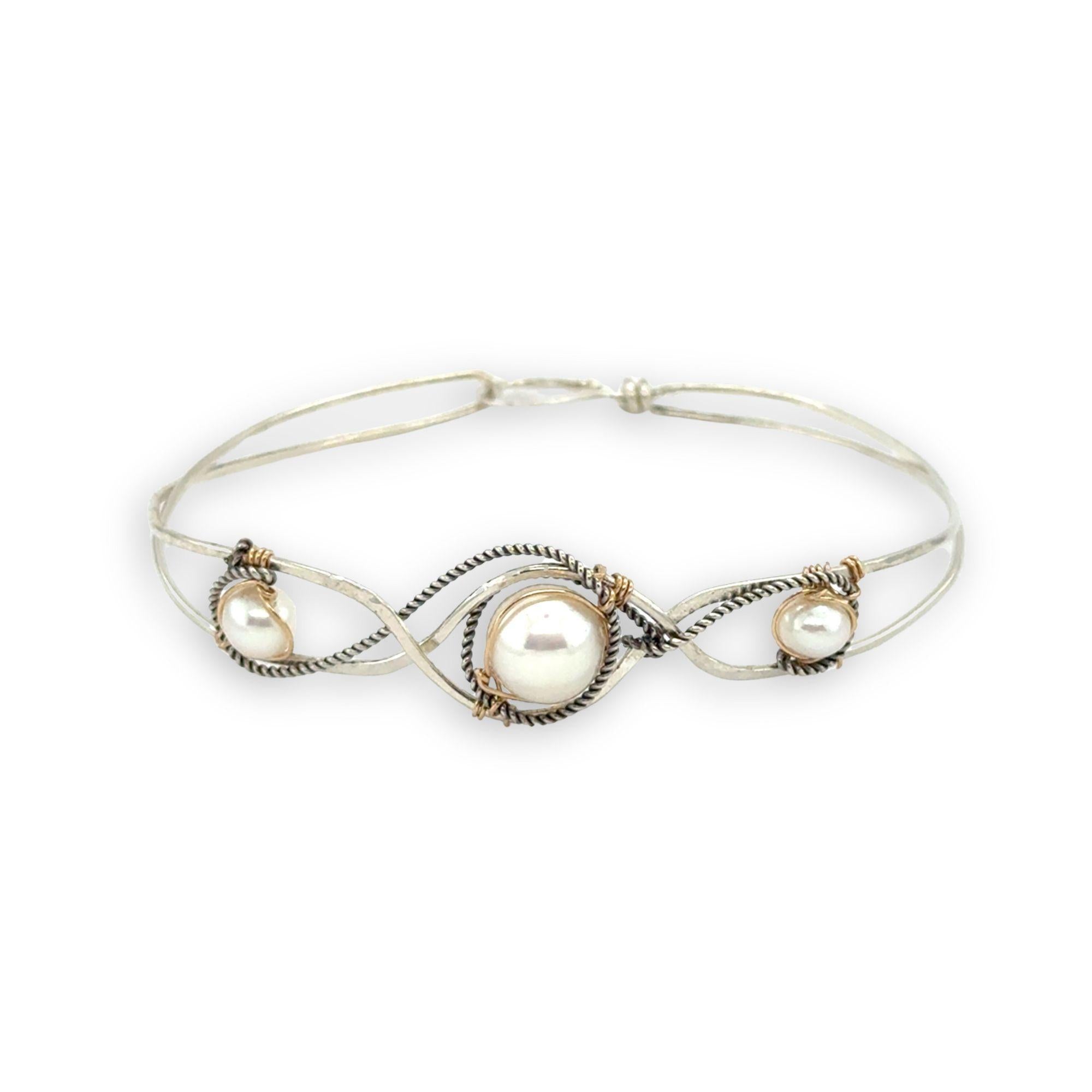 Sterling silver twisted bracelet with dark sterling twisted wire and fresh water pearls wrapped in gold fill wire