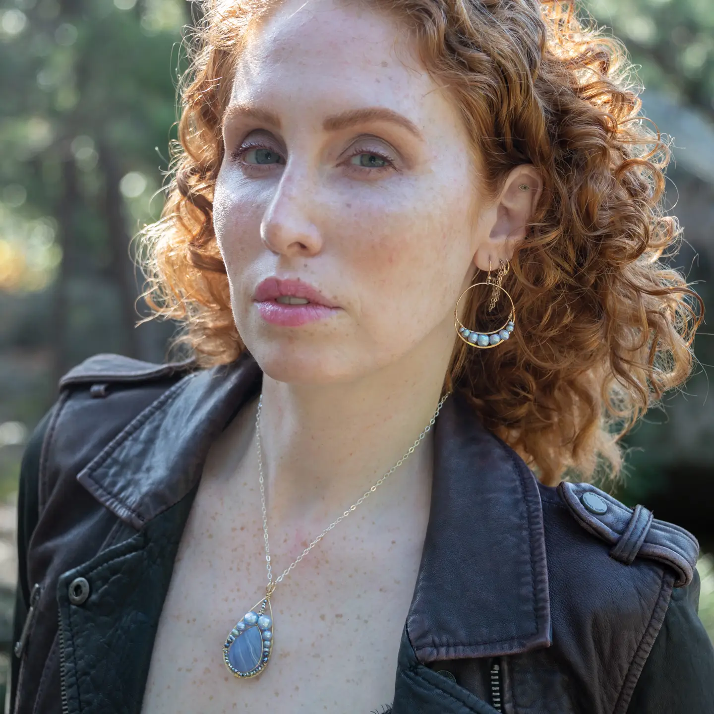 Sky blue jasper and pearls in bronze drop pendant on a sterling silver adjustable chain