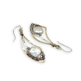 Fresh water pearl tiles held in brass mini dove wing earrings surrounded by mini crystals on sterling silver wire