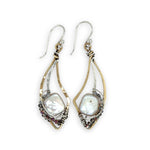 Fresh water pearl tiles held in brass mini dove wing earrings surrounded by mini crystals on sterling silver wire