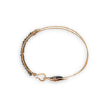 Brass arrow shaped cuff bracelet with faceted smokey quartz gemstones and tile