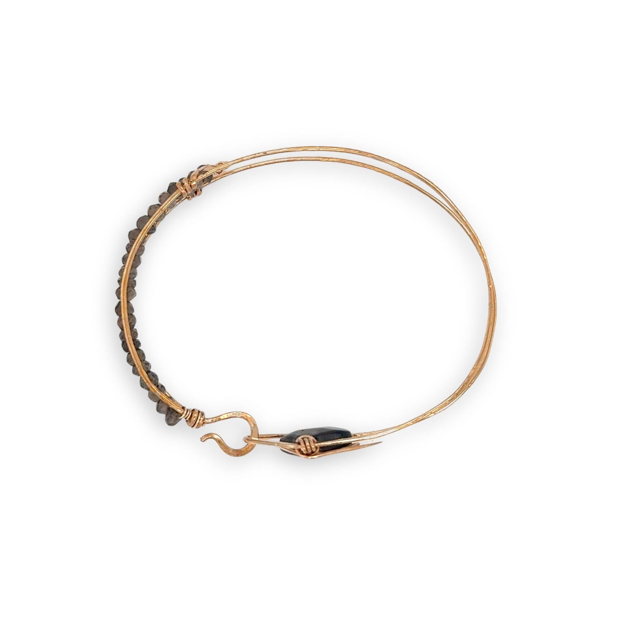 Brass arrow shaped cuff bracelet with faceted smokey quartz gemstones and tile