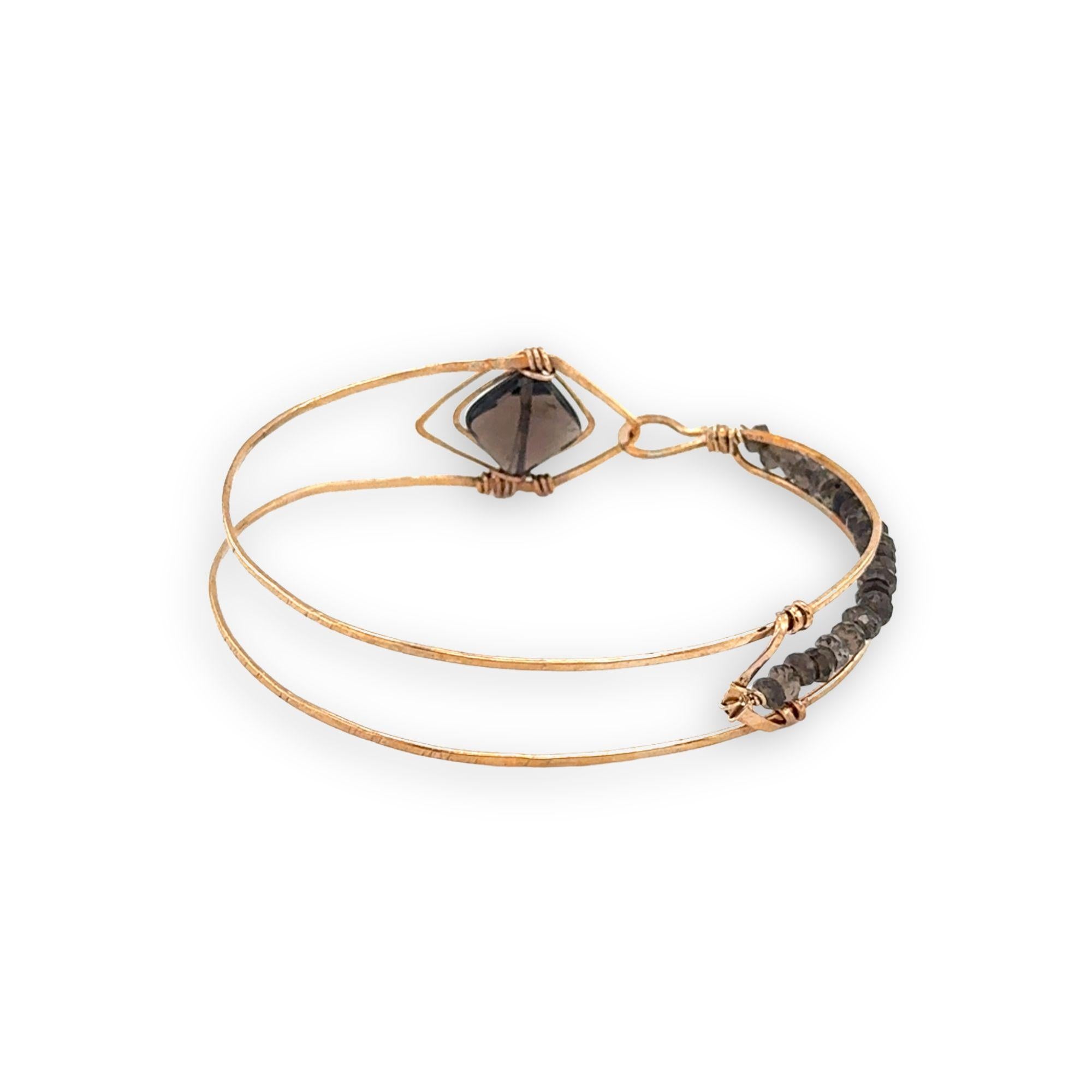 Brass arrow shaped cuff bracelet with faceted smokey quartz gemstones and tile