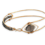 Brass arrow shaped cuff bracelet with faceted smokey quartz gemstones and tile
