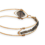 Brass arrow shaped cuff bracelet with faceted smokey quartz gemstones and tile