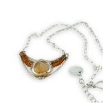 Sterling silver crescent pendant filled with a citrine nugget wrapped in sterling and gold filled wires, surrounded by orange citrine and ombre mookaite jasper gemstone necklace