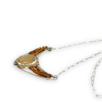 Sterling silver crescent pendant filled with a citrine nugget wrapped in sterling and gold filled wires, surrounded by orange citrine and ombre mookaite jasper gemstone necklace