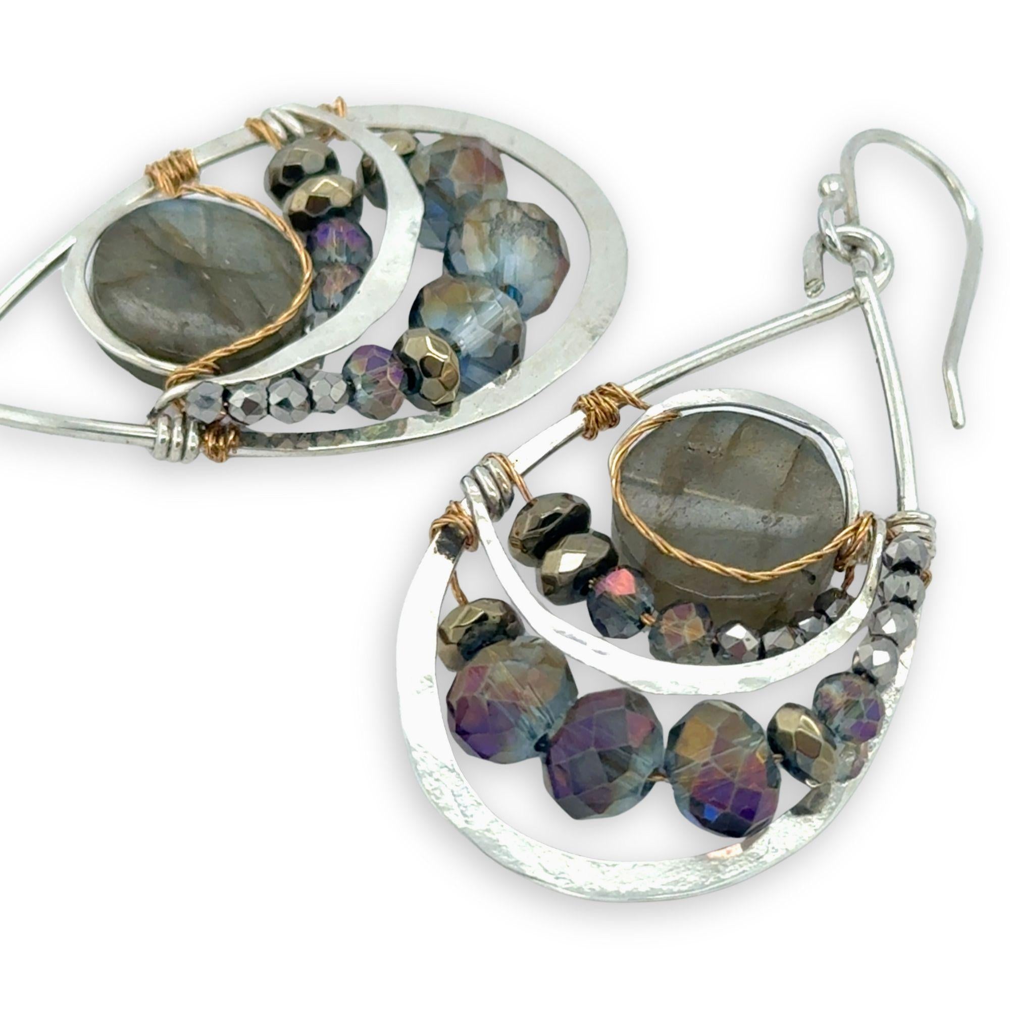 Smooth labradorite flashy gemstones surrounded by pyrite and blue purple crystals wrapped in brass twist on sterling silver drop earrings