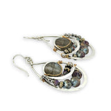 Smooth labradorite flashy gemstones surrounded by pyrite and blue purple crystals wrapped in brass twist on sterling silver drop earrings
