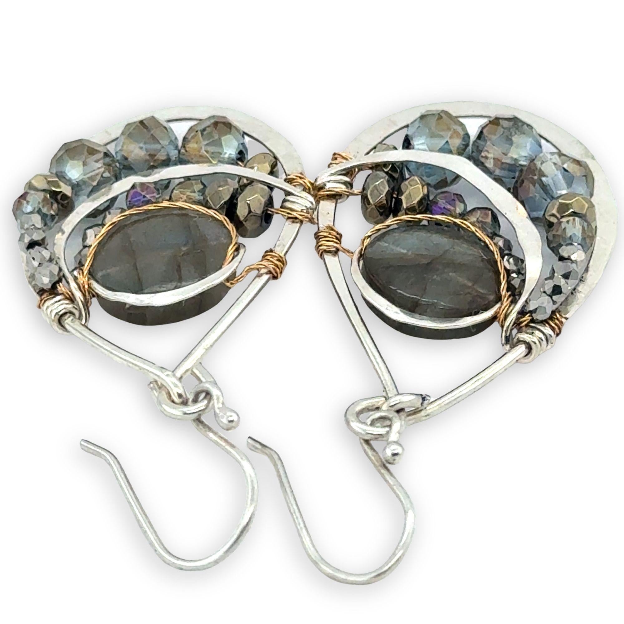 Smooth labradorite flashy gemstones surrounded by pyrite and blue purple crystals wrapped in brass twist on sterling silver drop earrings