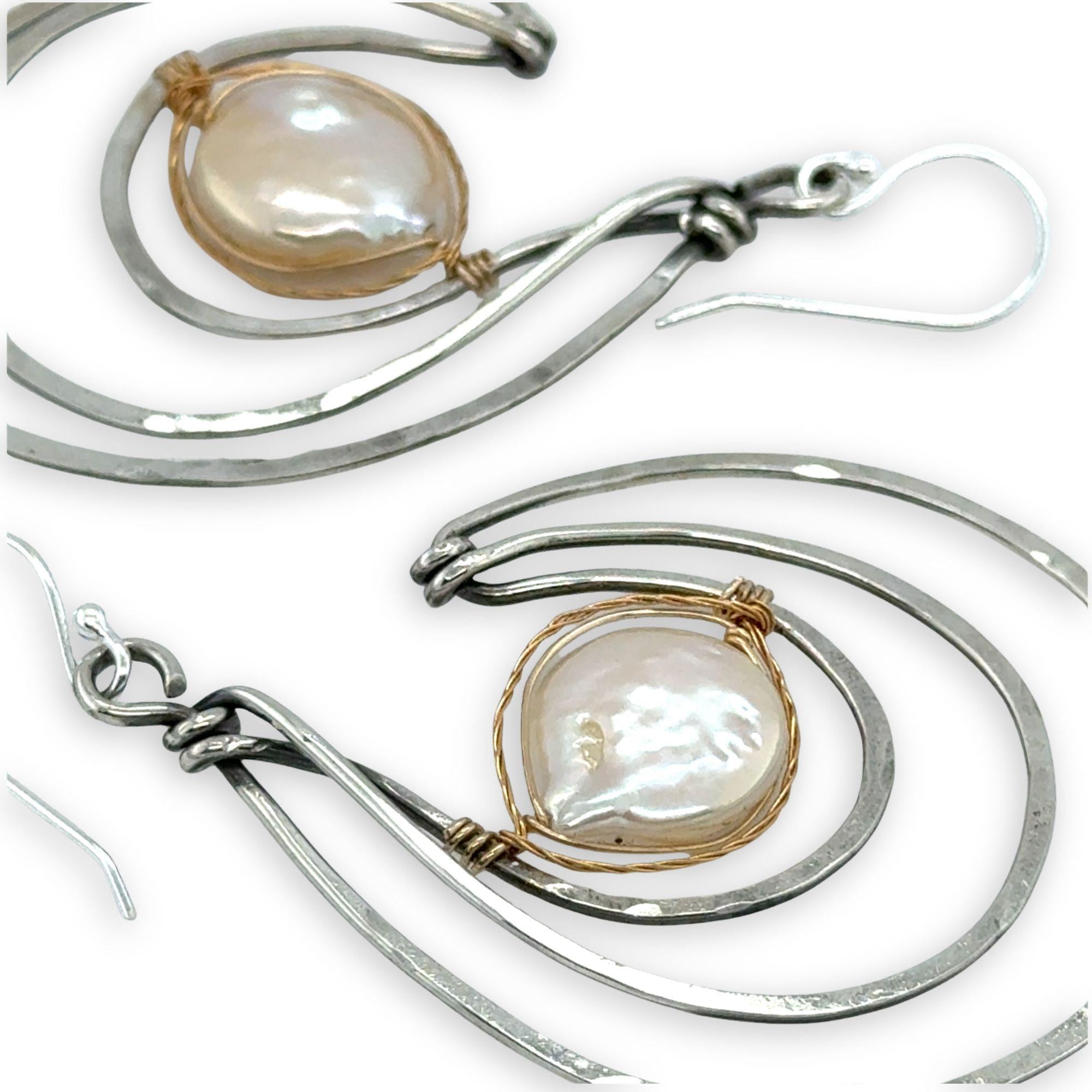 Pair of sterling silver statement earrings with fresh water pearl coins held in gold filled and brass twist wires