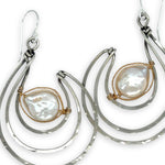 Pair of sterling silver statement earrings with fresh water pearl coins held in gold filled and brass twist wires