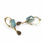 Muted moss green crystal tile built into a brass arch earring wrapped in gold filled wire with a smokey quartz faceted drop dangle and built in gold filled earring hooks that wear like a post earring