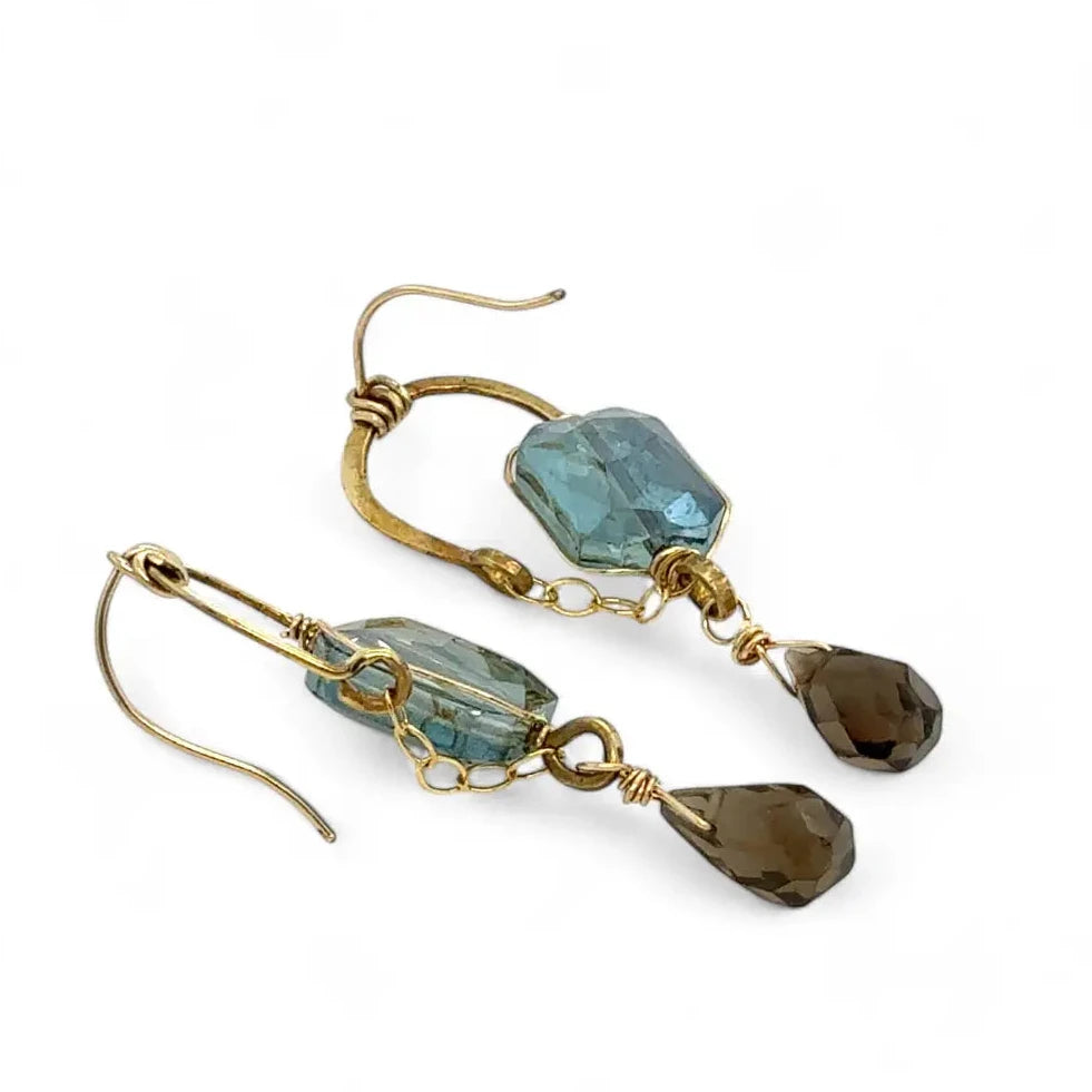 Muted moss green crystal tile built into a brass arch earring wrapped in gold filled wire with a smokey quartz faceted drop dangle and built in gold filled earring hooks that wear like a post earring