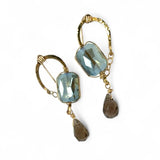 Muted moss green crystal tile built into a brass arch earring wrapped in gold filled wire with a smokey quartz faceted drop dangle and built in gold filled earring hooks that wear like a post earring