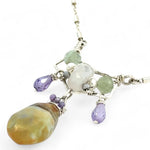 Striped green blue agate drop and lavender cubic zirconia drops hang from a hammered sterling silver mini pendant containing moontstone and prehnite gemstones on a sterling silver tube chain necklace