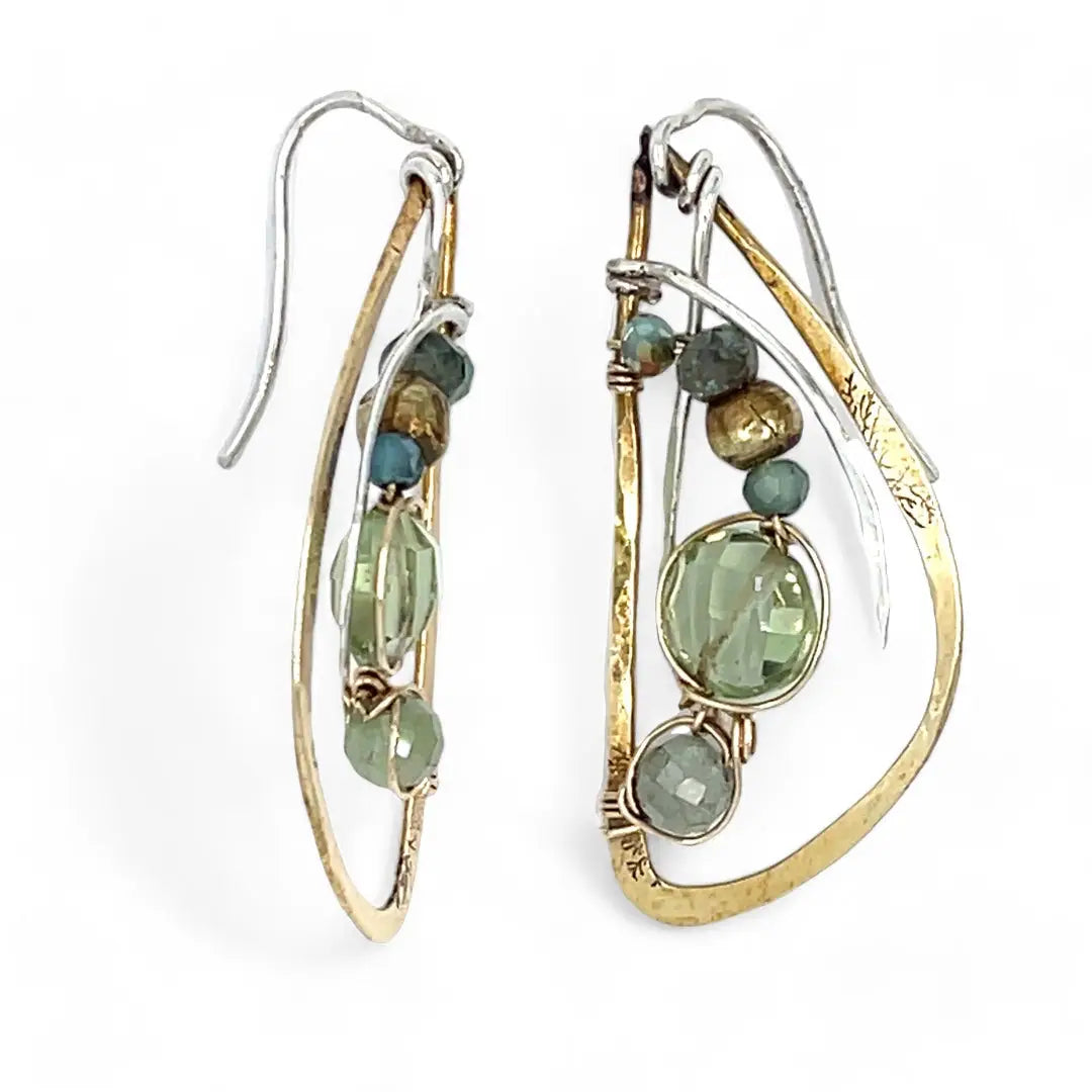 Tree stamped brass semi circle earrings embellished with green amethyst coins, prehnite, emerald, crystal, and african brass beads wrapped in gold filled wire with built in sterling silver earring hooks that wear like a post earring