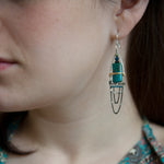 Apatite smooth rectangles topped with chrysocolla and pyrite gemstones held within a sterling silver earring with brass wire and satellite sterling silver oxidized dot chain accents