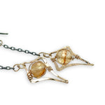 Gold filled mini stars with citrine faceted sphere gemstones hang from darkened sterling silver delicate chain earrings