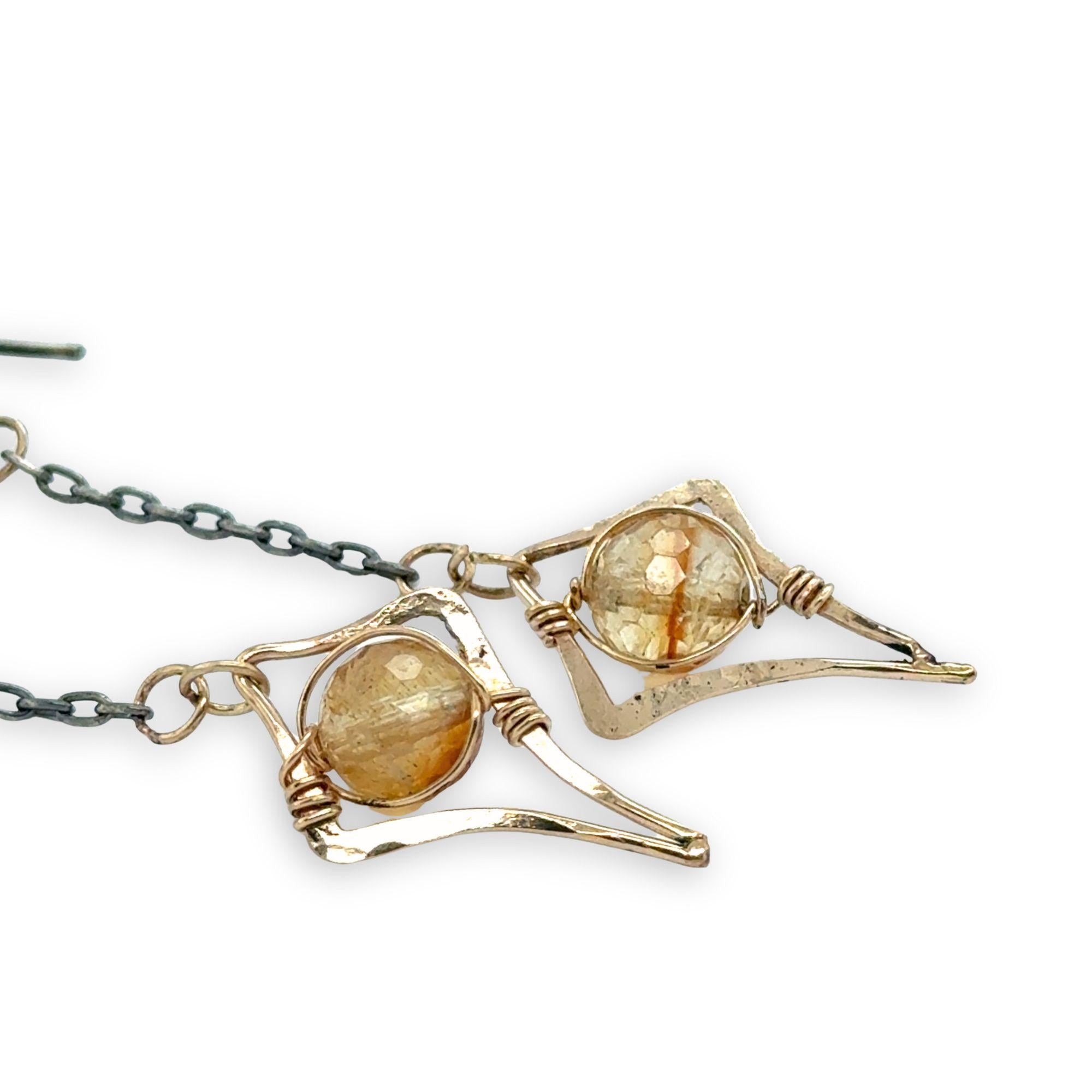 Gold filled mini stars with citrine faceted sphere gemstones hang from darkened sterling silver delicate chain earrings