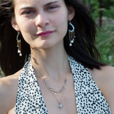 A pair of sterling silver oxidized lead stamped cloud-shaped earrings with white sapphire faceted drops fresh water pearls hanging from gold-filled crinkle chains