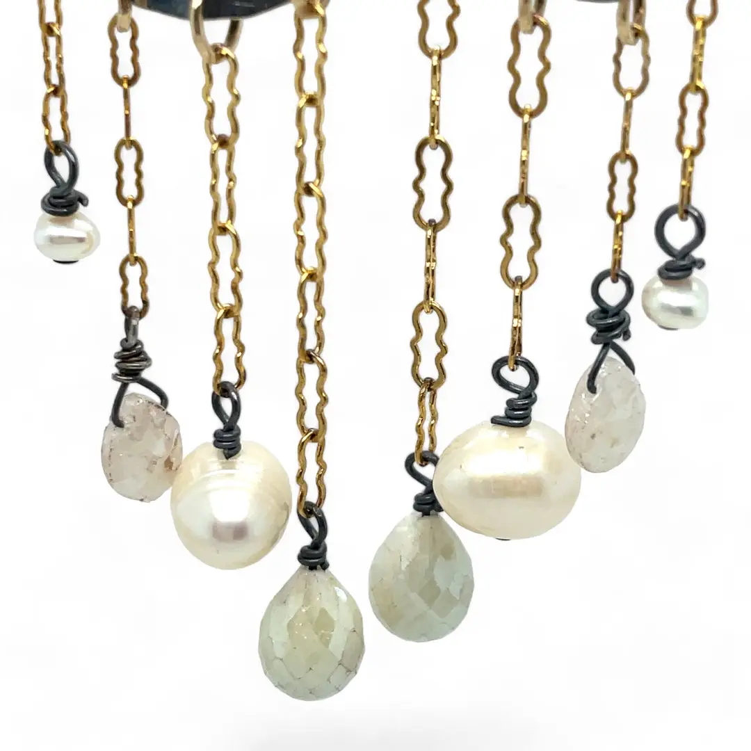 A pair of sterling silver oxidized lead stamped cloud-shaped earrings with white sapphire faceted drops fresh water pearls hanging from gold-filled crinkle chains