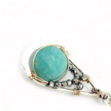 A mini sterling silver drop pendant with amazonite and pyrite gemstones in gold filled wire on a dainty sterling silver chain with oxidized sterling crinkle chain accent necklace