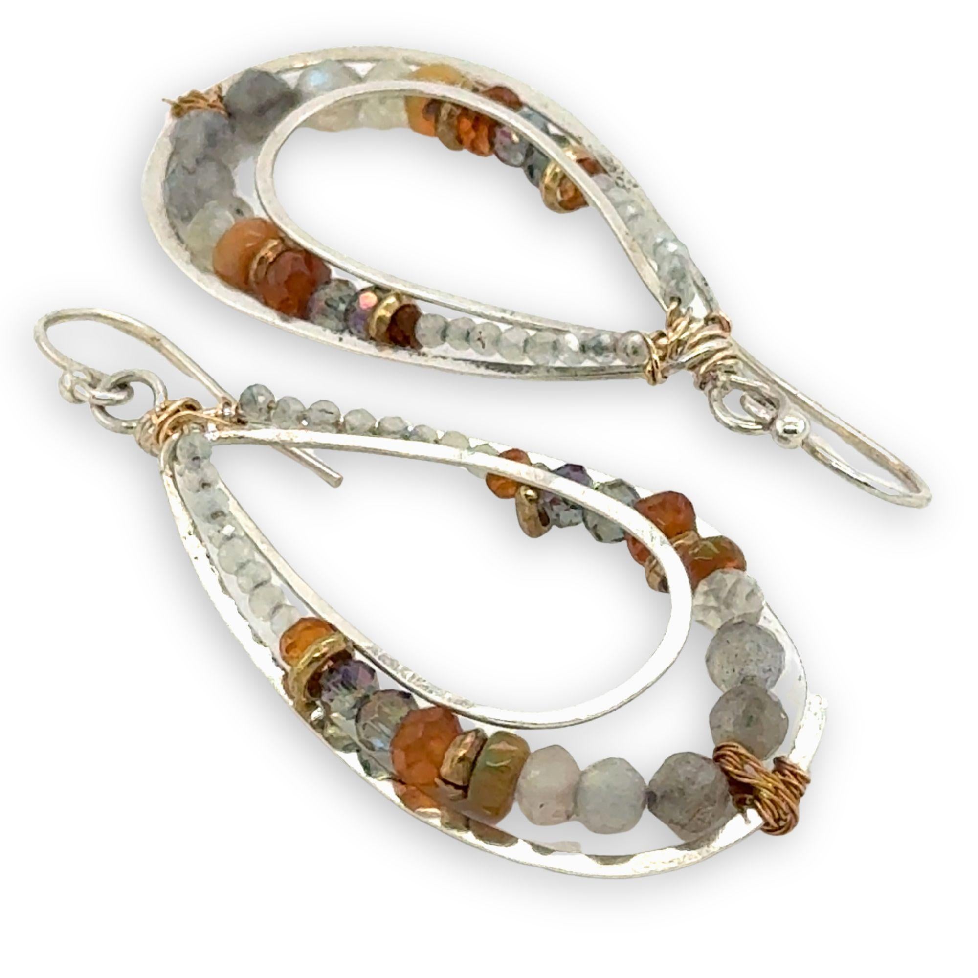 Labradorite, citrine, hessonite garnet, prehnite, and crystal gemstones are held within the channel of handmade sterling silver channel drop earrings