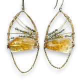 Citrine nuggets held in a bronze marquise earring frame accompanied by gold filled wire, rutilated quartz gemstones, and gold filled satellite chain