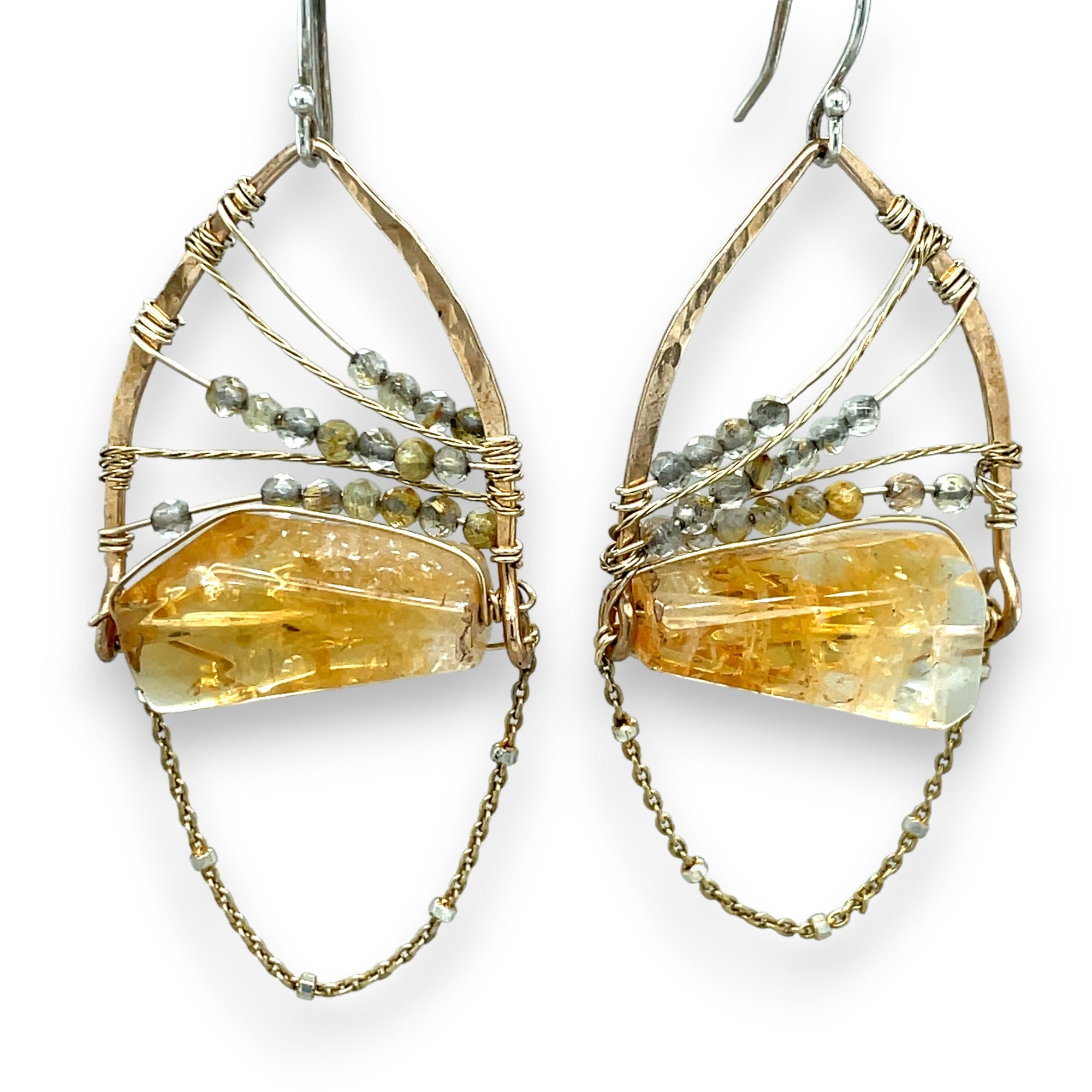 Citrine nuggets held in a bronze marquise earring frame accompanied by gold filled wire, rutilated quartz gemstones, and gold filled satellite chain