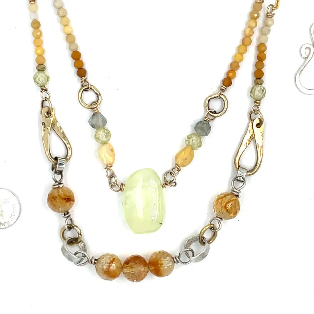 smooth prehnite, opal, green amethyst and mookaite gemstones form the inner layer while the outside is made up of faceted citrine orbs, brass hammered teardrops, and mookaite ombre gemstones necklace
