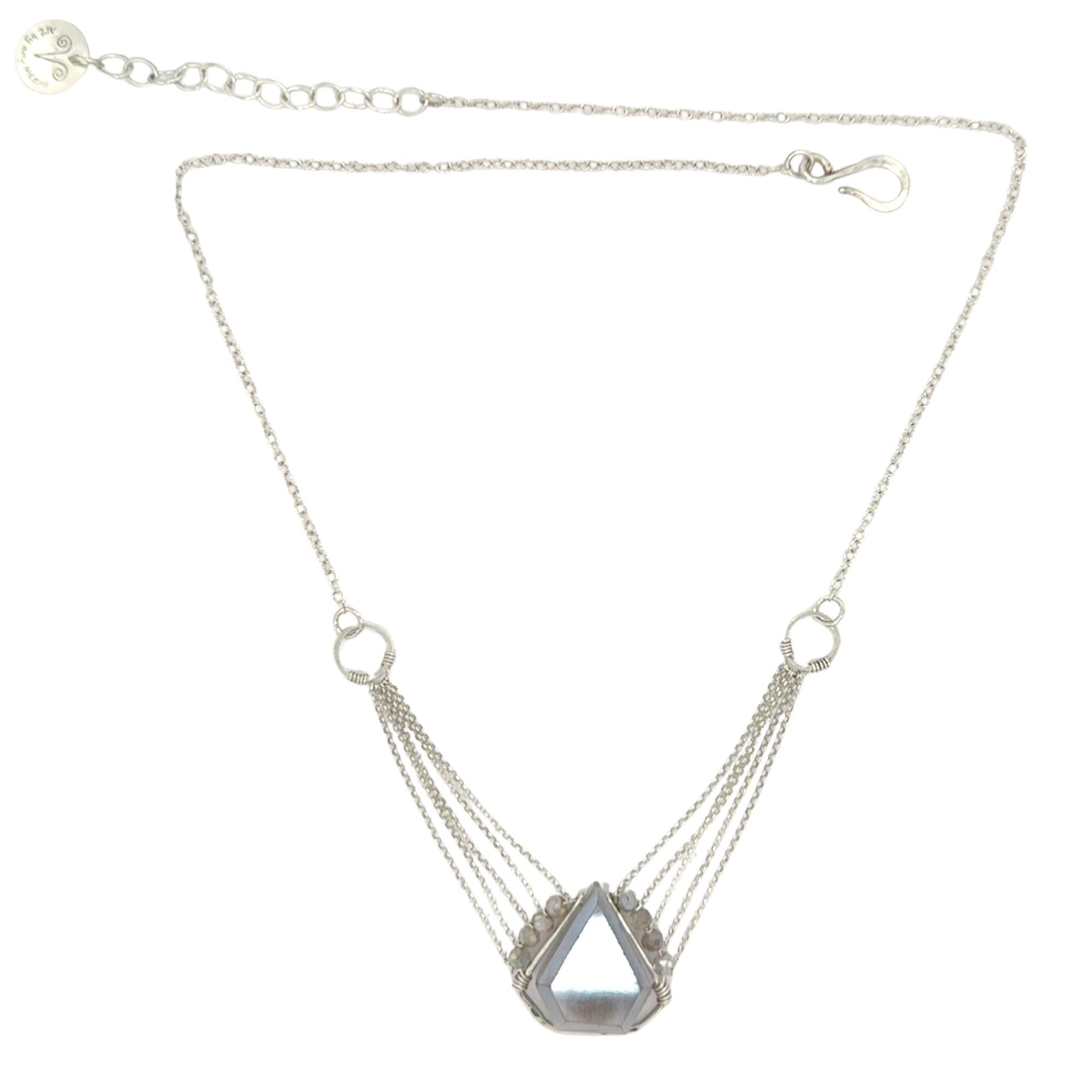 pointed moonstone in a sterling silver mini pendant necklace with multi chains onto handmade sterling silver rings