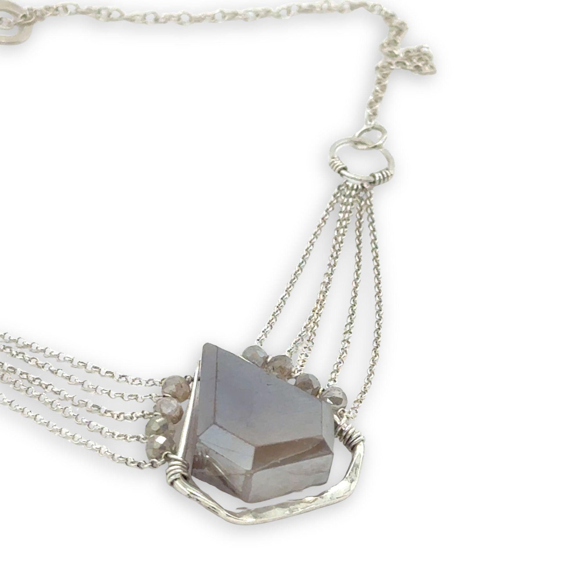 pointed moonstone in a sterling silver mini pendant necklace with multi chains onto handmade sterling silver rings