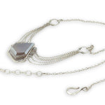 pointed moonstone in a sterling silver mini pendant necklace with multi chains onto handmade sterling silver rings